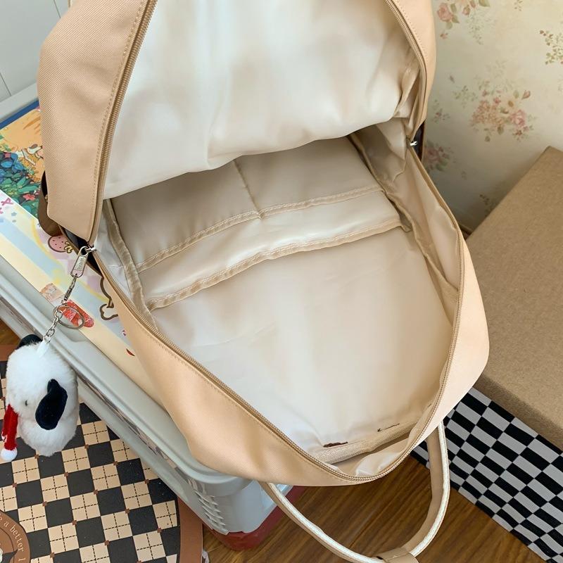 New high-value and lightweight schoolbag for junior high school students, college students, niche contrasting colors, portable backpack for women