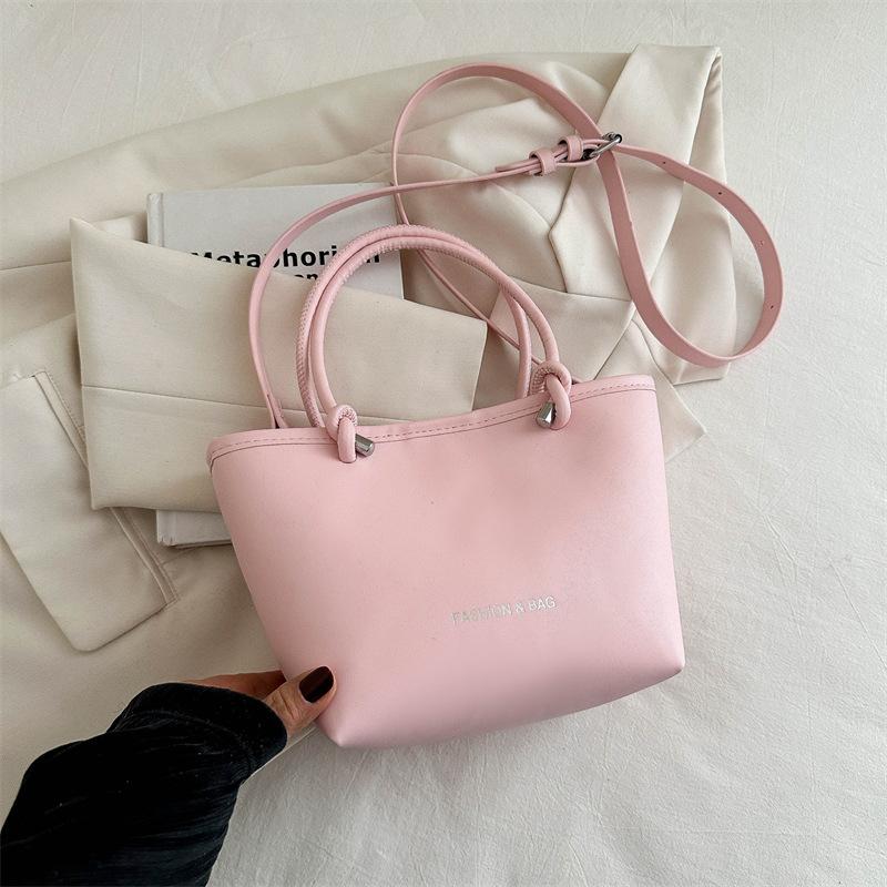 

Популярная в этом году модная корейская версия сумки-ведра 2025 весна и лето новая универсальная повседневная сумка в стиле инс однотонная сумка-мессенджер женская розовый