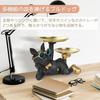 Perro acostado sosteniendo dos platos encantador interesante pose decoración de interiores almacenamiento Respeto Día del Anciano regalo de cumpleaños regalo gafas.