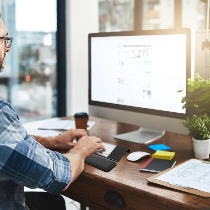 Anti Slip Silicone Base Keyboard Holder with Wrist Pad Stability And Secure Placement On Smooth Desktops For Users