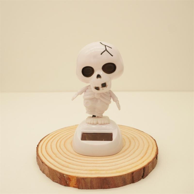 1PC Auto Trinket Accessories Fashionable Solar Power Swinging Skull Doll Creative Shaking Head Skeleton Car Decoration