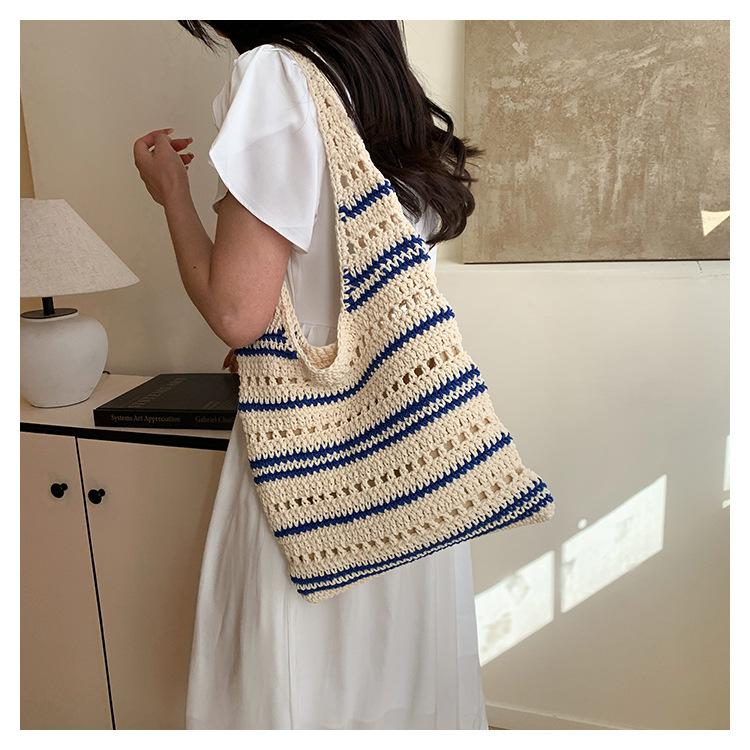 Shoulder bag women's spring and summer new straw woven tote bucket bag hollow large capacity underarm bag woven bag