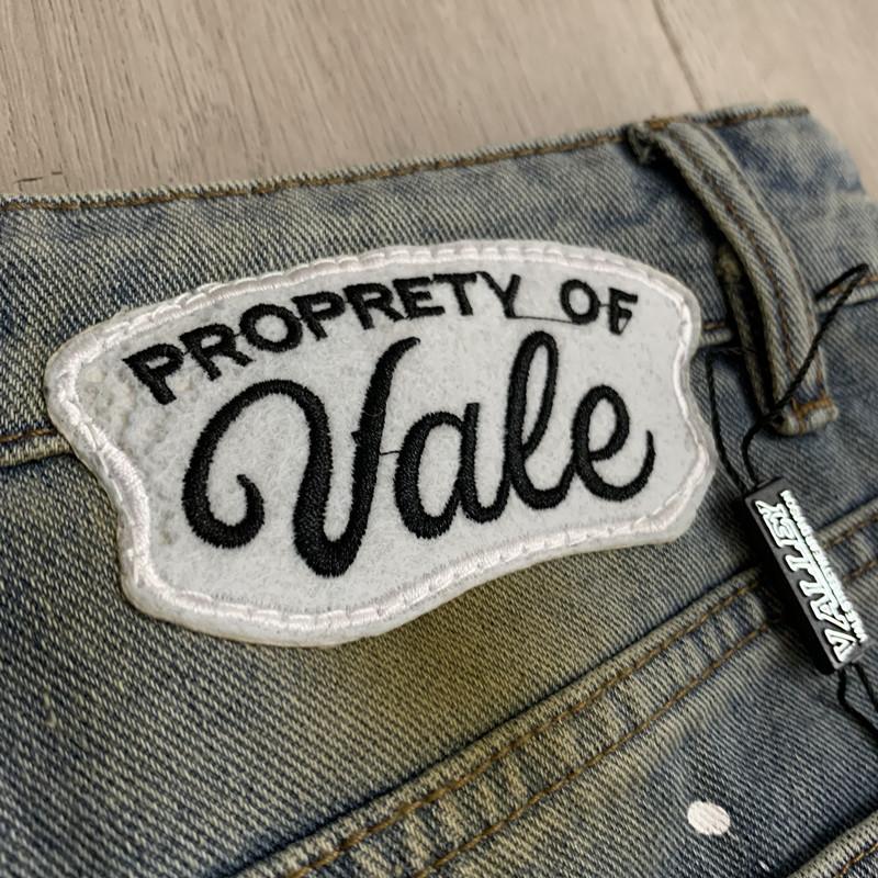 Trendige Marke Va & le digitaler Buchstabenaufkleber bestickte Jeans-Shorts mit Tintenspritzern Herren und Damen High Street alte Fünf-Punkt-Hosen