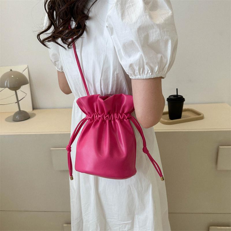 Fashionable Simple Bucket Bag For Women With Soft Structure Available In Black White Brown And Fuchsia