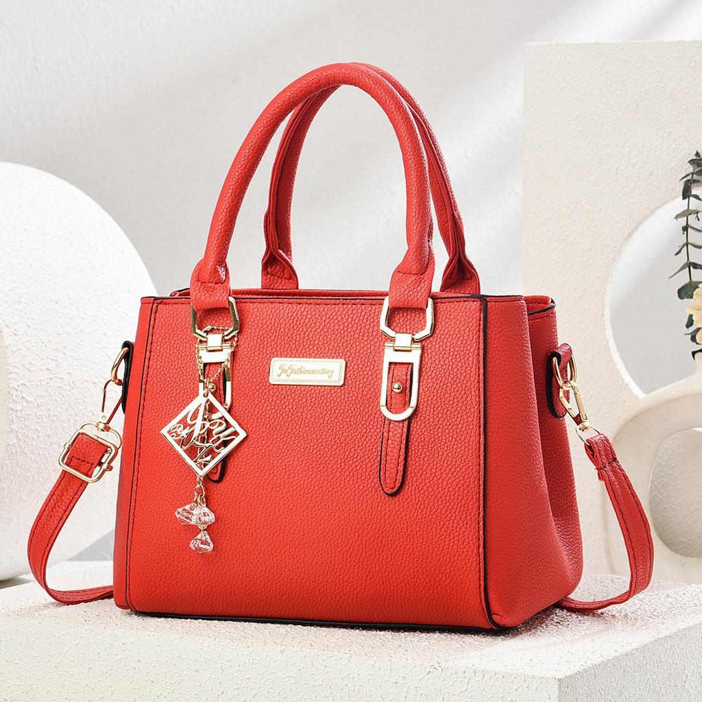 Simple and large-capacity hot-selling handheld women's bags 2026 new fashionable and versatile PU material single shoulder oblique span small