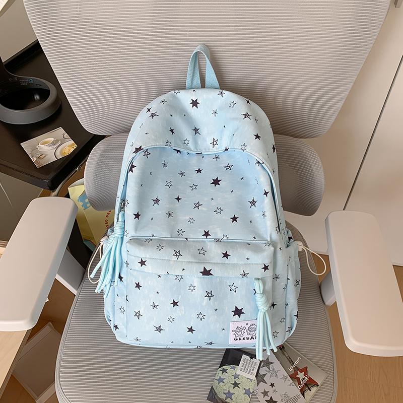 Star-Printed Backpack with Front Zipper Pocket and Tassel Details for School and Daily Use