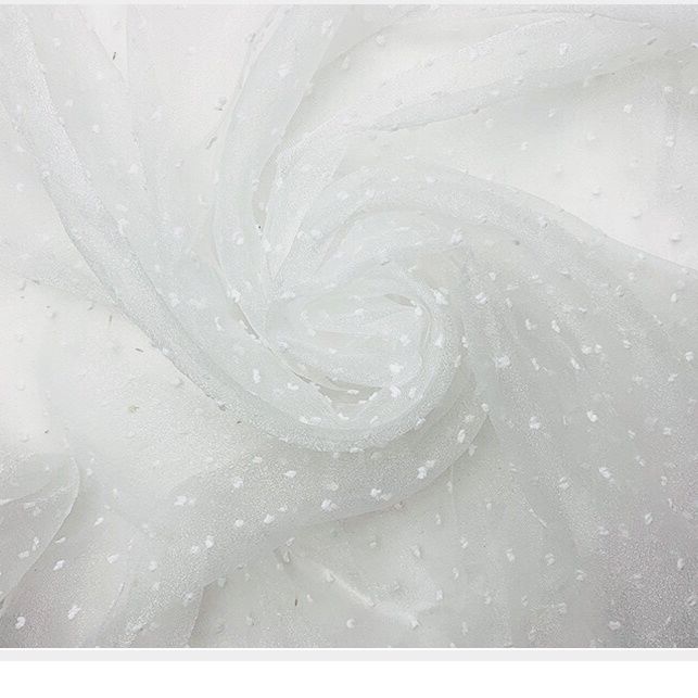 Soft bubble yarn and fluffy organza fabric can be used for wedding dresses evening gowns and designer clothing fabrics