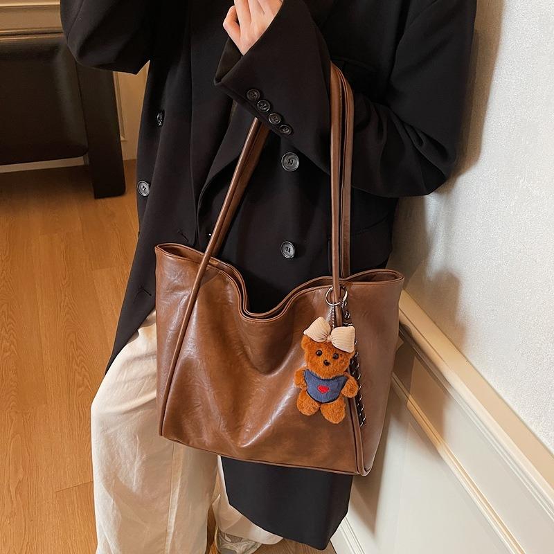 Bag women's new soft leather tote bag large capacity women's niche high-end sense of commuting to work portable shoulder bag