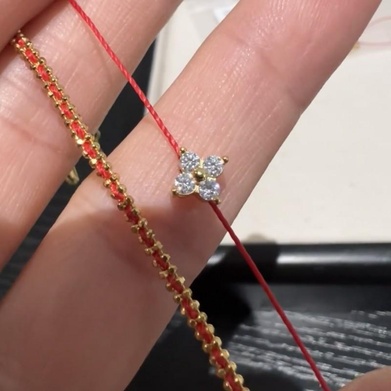 Handgewebtes rotes Schnurarmband mit vergoldetem vierblättrigem Klee-Anhänger für Damen, Paare, Luxuriöser minimalistischer Stil