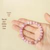 Putuo Mountain Pink Cat's Eye Bracelet: Elegant Cultural Gift for Men, Women, and Friends.