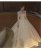 Elegant Backless Satin Wedding Gown - Vintage French-Inspired Long Sleeve Dress
