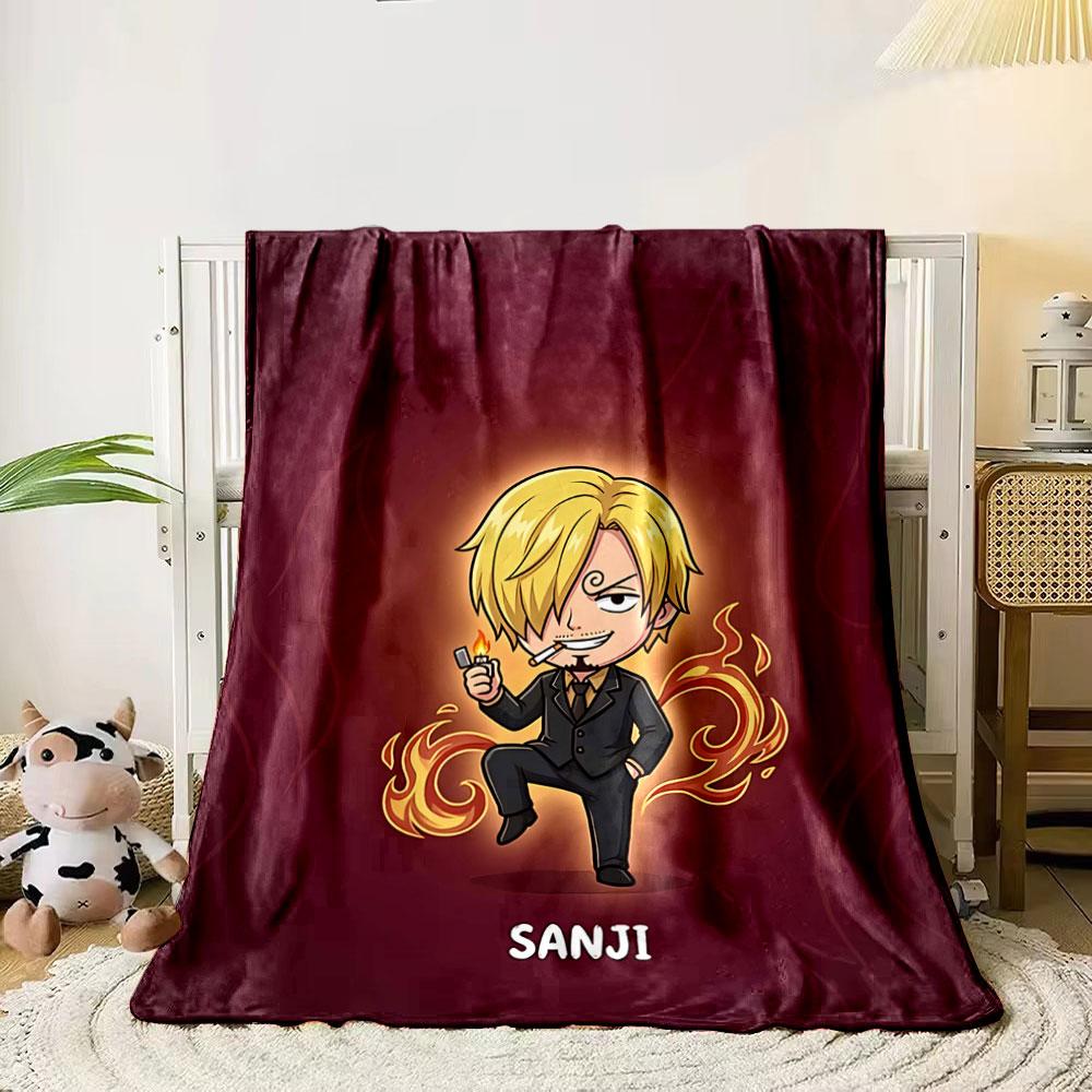 A blond character in black suit with flames and a cigarette. for all seasons blanket lunch break throw gift 80cm x 120cm