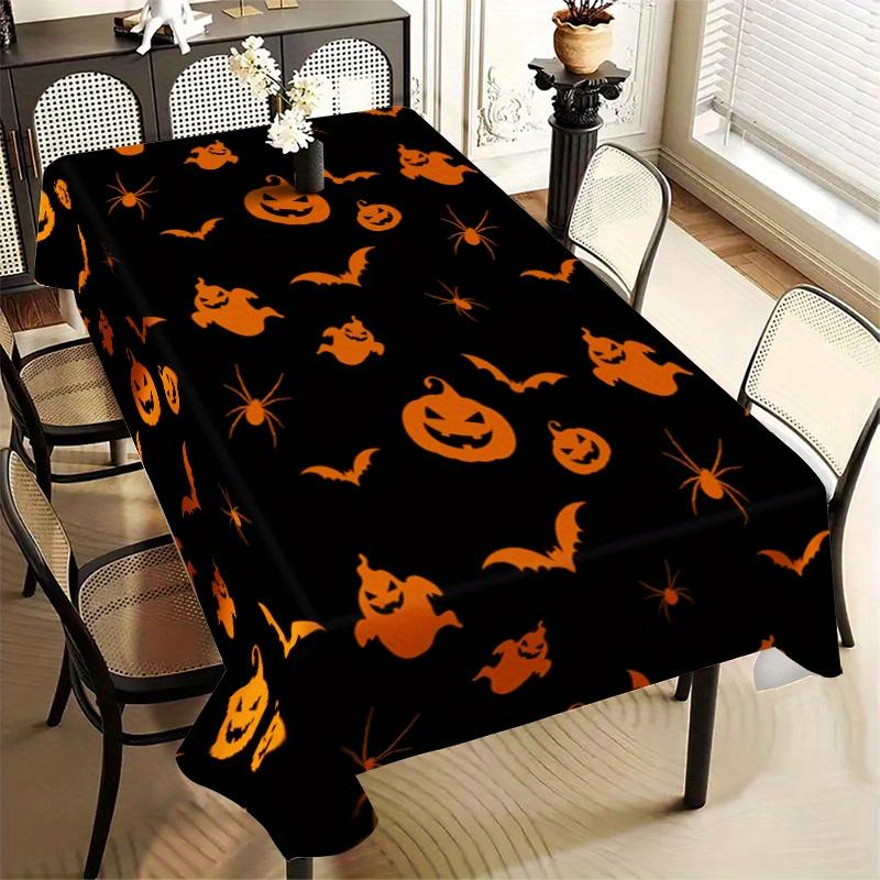 One Halloween tablecloth - rectangular polyester fabric tablecloth with pumpkin, spider web and bat patterns.PMJ