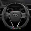 Genuine Leather & Suede Carbon Fiber Steering Wheel Cover for Toyota Camry, RAV4, Highlander, and Corolla.