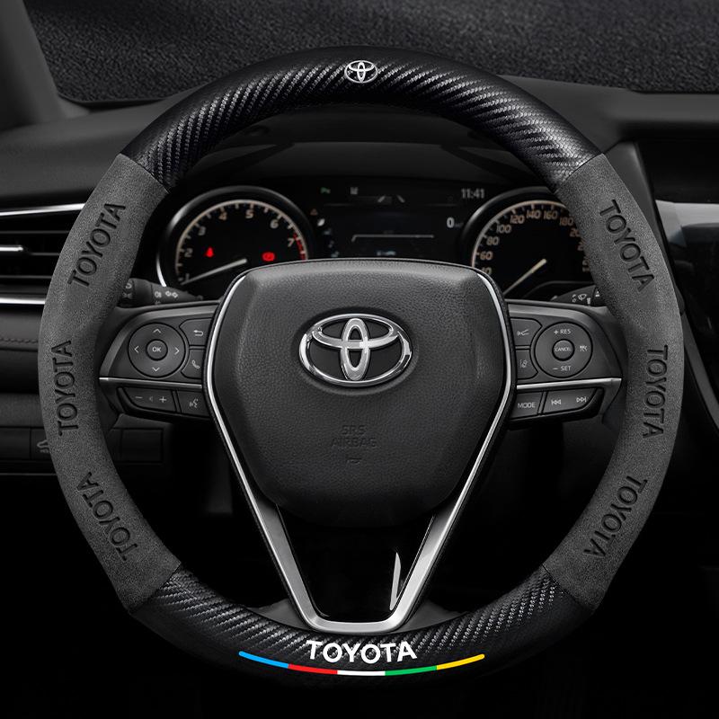 Genuine Leather & Suede Carbon Fiber Steering Wheel Cover for Toyota Camry, RAV4, Highlander, and Corolla.