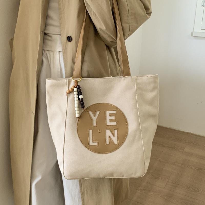 2025 New Autumn and Winter Versatile Lightweight Large Capacity Shoulder Bag Premium Commuter Simple Retro Portable Tote Bag