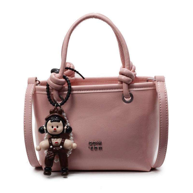 2025 new Korean simple oil wax leather portable bucket bag fashionable versatile solid color foreign style commuter messenger women's bag