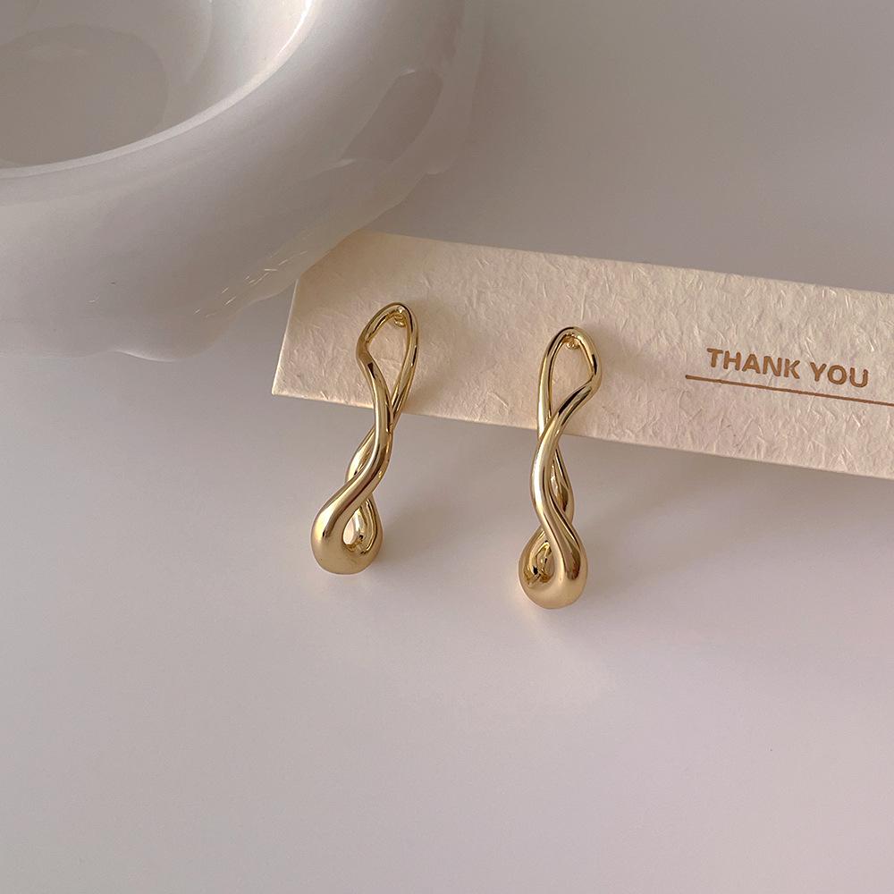 

Геометрические серьги-пусеты из серебра s925 с переплетенными линиями для женщин - Универсальный дизайн золотой