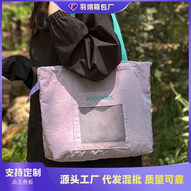 Large-capacity casual tote bag women's new fashion niche lightweight shoulder bag class commuter bag