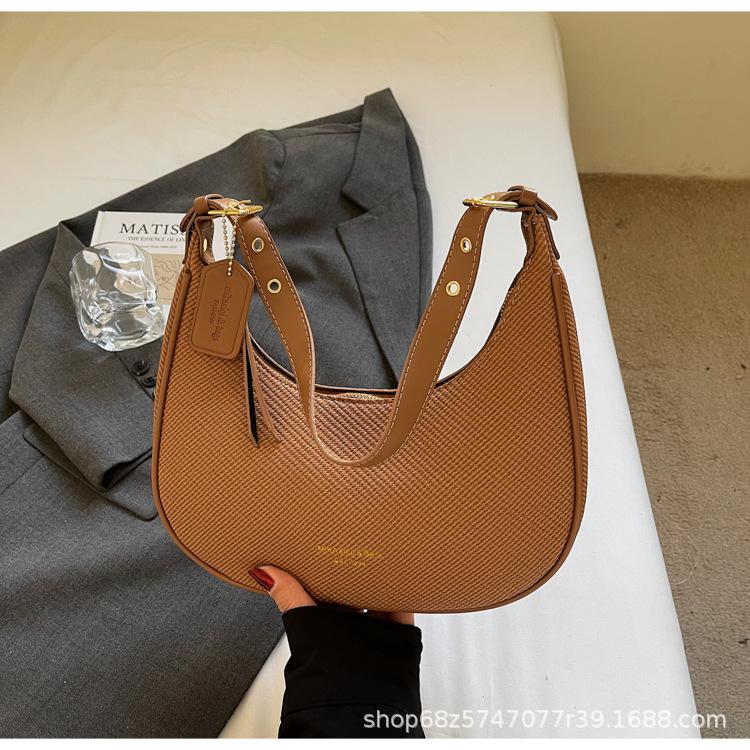 

Xiaohongshu popular crescent bag large-capacity underarm bag women s 2025 new spring shoulder bag work crescent bag хакі