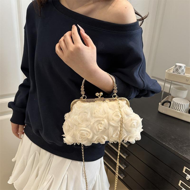 Summer new beautiful flowers light luxury sweet solid color dinner bag high sense portable shoulder messenger bag women