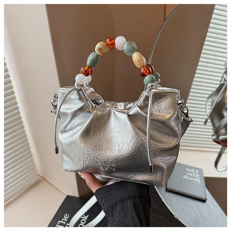 Pleated high-end fashion versatile new bucket bag women's solid color cute niche design messenger bag