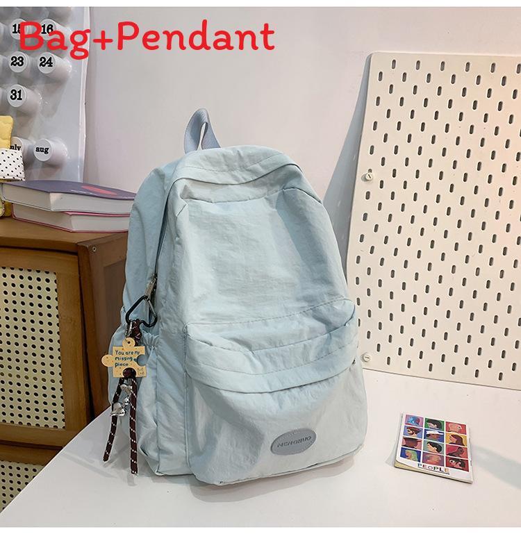 Minimalist Solid Color Backpack For Women And Men With Durable Nylon Material Suitable For Casual Travel And School Use