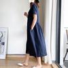 Dámské volné bavlněné šaty Letní ležérní šaty midi plus size Kulatý výstřih Krátký rukáv Plisované áčkové šaty s kapsami
