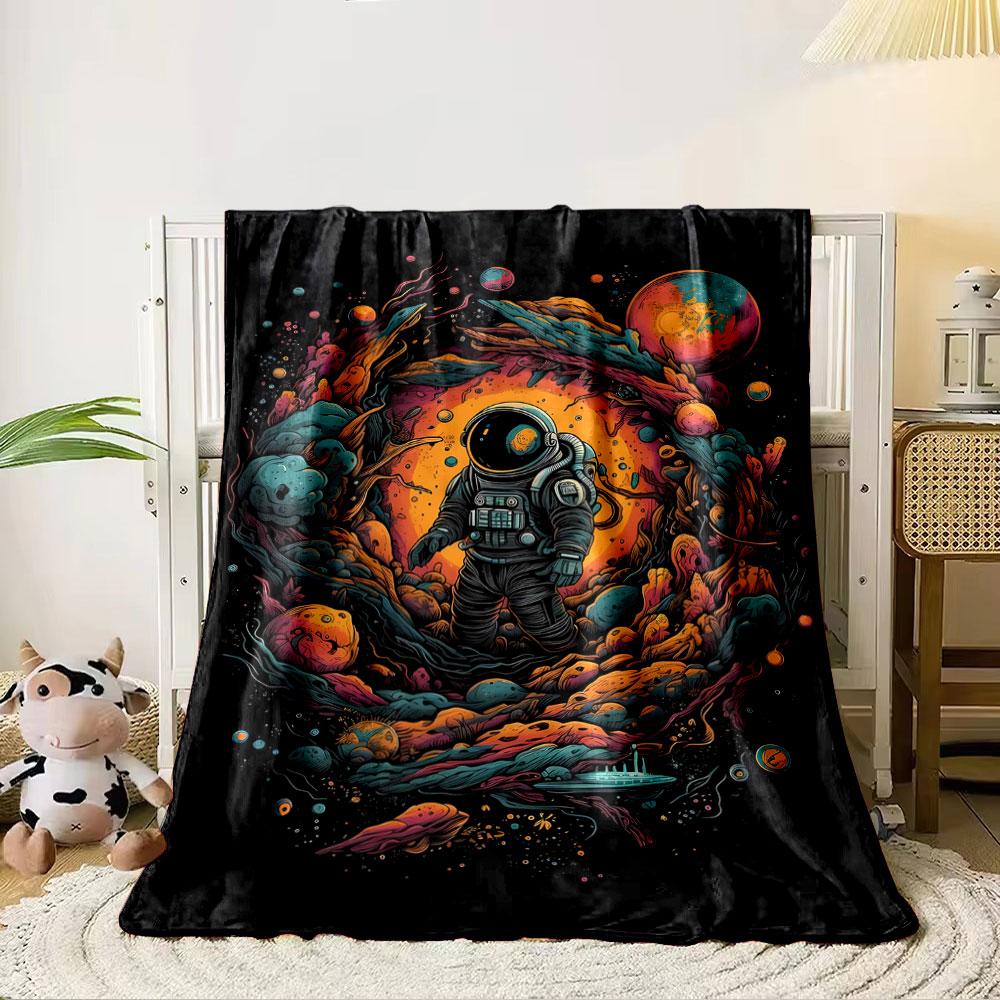 Vibrant space scene with an astronaut surrounded by swirling cosmic forms. for all seasons blanket lunch break throw gift