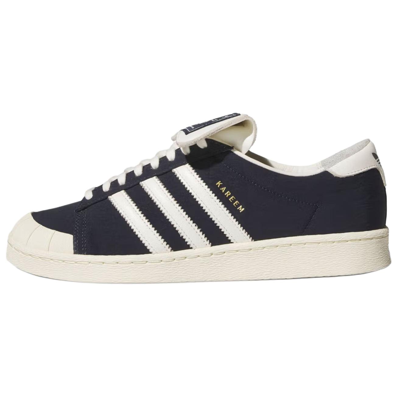 

Willy Chavarria x adidas Jabbar Low Чернила Белый офф Унисекс Кроссовки Синий Легенда-Чернила Кремово-Белый KJ4550 42⅔