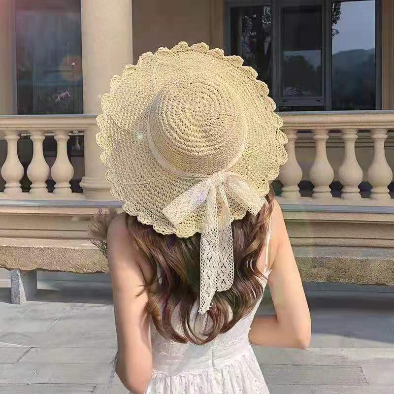 Lace straw hat women's summer bow hollow straw weaving sunscreen sunshade bucket hat sweet beach outing hat
