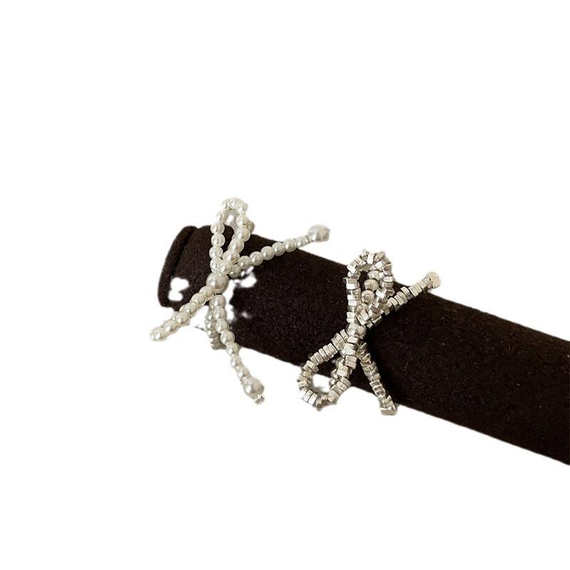 Exquisite Silver Pearl Bow Elastic Ring for Women – Versatile and Stylish Design
