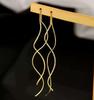 Silver Wave Thread Earrings: Elegant, Versatile French Fashion for High-End, Modern Women