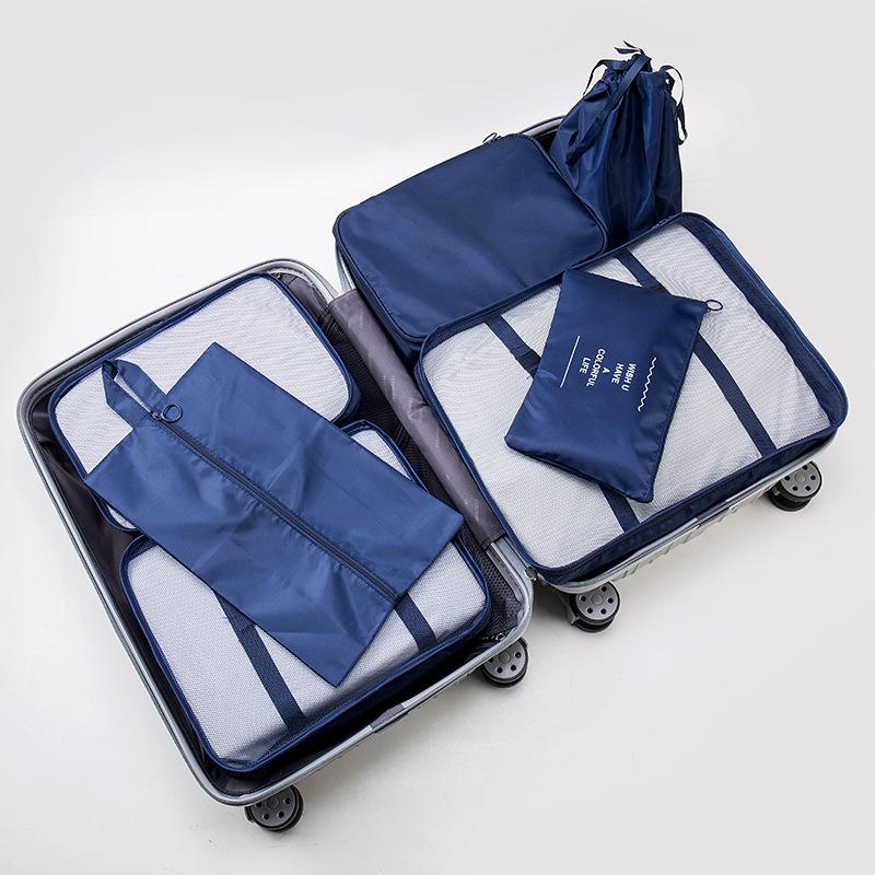 Eight-Piece Travel Organizer Set: Storage Bags & Makeup Bag for Clothes and Accessories.