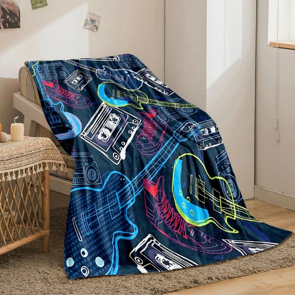 Guitars, cassettes, sneakers, and boomboxes in a colorful retro style. for all seasons blanket lunch break throw gift