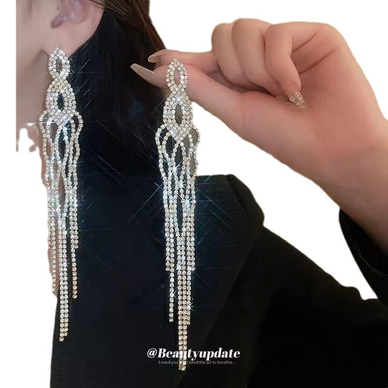 UK Noble Young Lady Luxury Long Tassel Diamond Earrings - High-End Design, Elegant and Exaggerated Style for Women.
