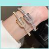 Elegante Bracciale in Rame con Dettagli in Pietra di Zircone Placcato Argento per una Sofisticatezza Casuale