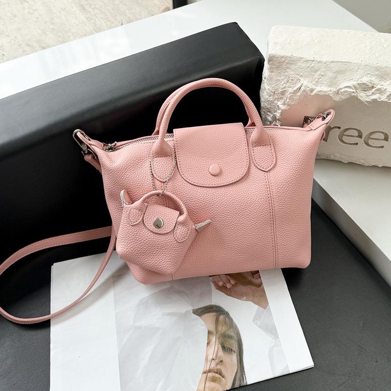 

First layer cowhide handbag large capacity leather women s bag dumpling bag fashion versatile single shoulder high sense messenger women s bag розовый