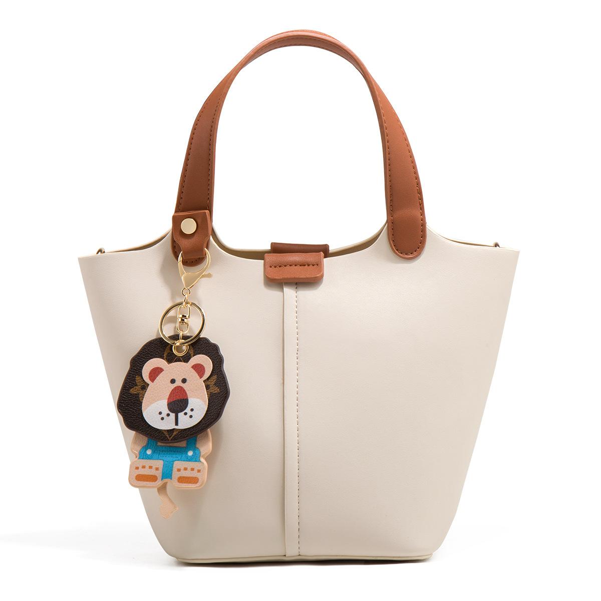 

Small bucket bag women s high-end bag 2025 new niche vegetable basket women s bag super hot portable messenger bag summer слоновая кость