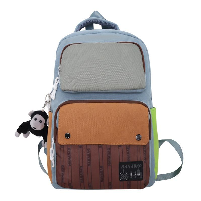 

Чоловічий рюкзак. Шкільний рюкзак для молодшого школяра. Жіночий контрастний колір світло-синій колір