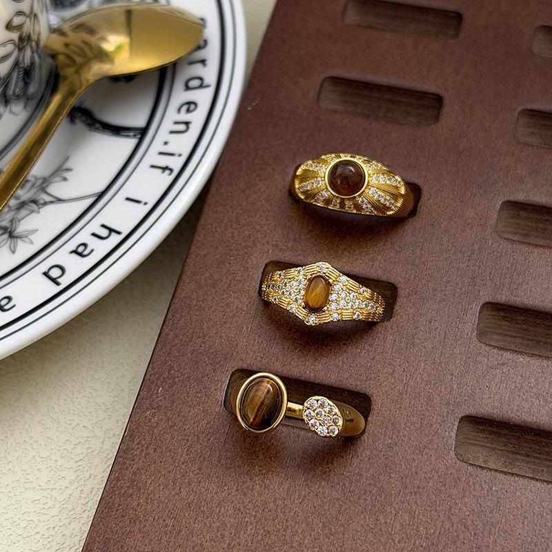 Hochwertiger leichter Luxus Retro Hof Nischen Design Leichter Luxus Imitation Tigerauge Stein Offener Ring Geometrischer Stapelring Frau