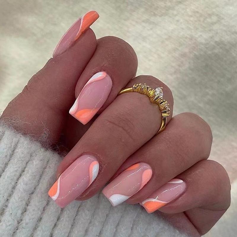 

Wearable nail orange and white splicing diagonal French wearing nail pink and white contrasting color wave finished nail nails