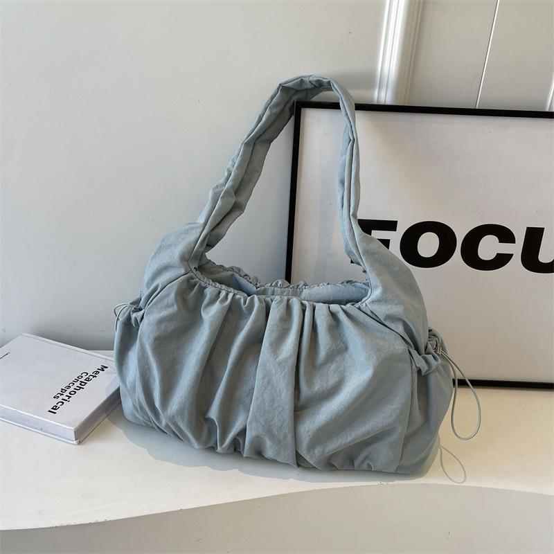 Niche Design Simple Canvas Shoulder Bag Women's 2026 Spring and Summer New Large-capacity Casual Commuter Armpit Bag