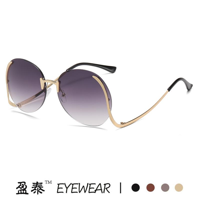 New gradual change marine frameless curved legs sunglasses fashion metal women sunglasses European and American sunglasses