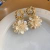 White pearl shell fringed earrings fashionable and elegant temperament earrings French light luxury high-end earrings women