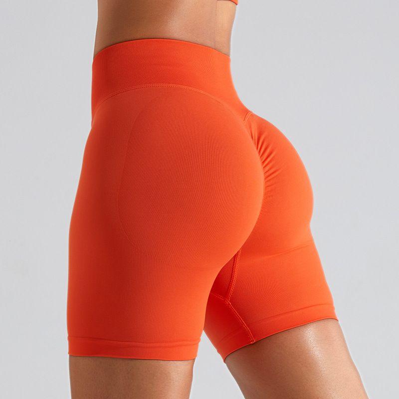 

Export New Seamless Yoga Peach Cycling Belly Contracting and Hip Lifting Pants Quick-Drying Skinny Running Exercise Workout Pants Shorts Women Orange Red XL