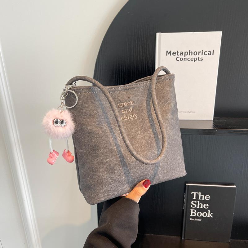 Портативная тканевая сумка Niuzi Женская летняя 2025 Новая трендовая корейская вышитая сумка подмышку Универсальная сумка через плечо Сумка-ведро