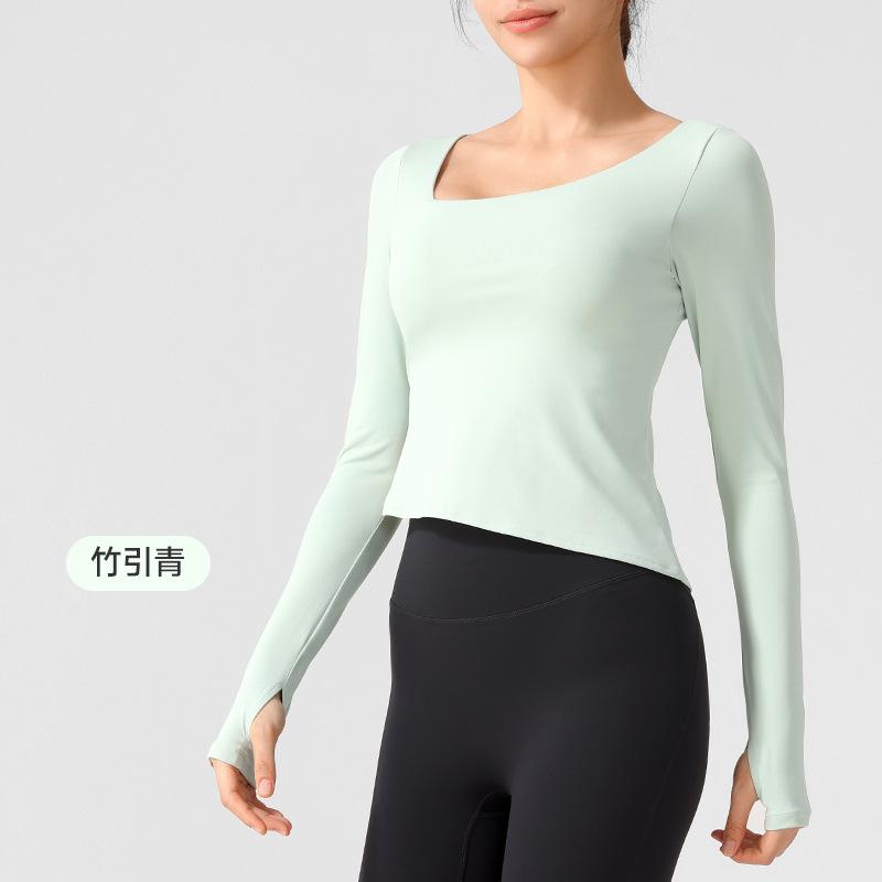 Yoga clothes new long-sleeved nude high elastic sports t-shirt women's one-piece fixed cup high-end fitness clothes spring and summer