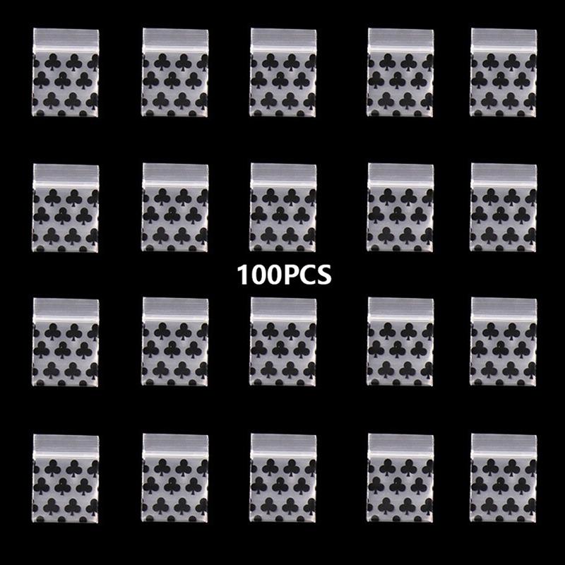 100 st Liten blixtlåsväska Smile Skull Mönster Bärbar förvaringsväska Transparent