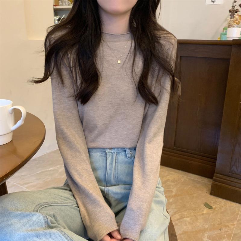 Lazy wind crimped knitted sweater women's early spring simple fashion long-sleeved inner top bottoming shirt